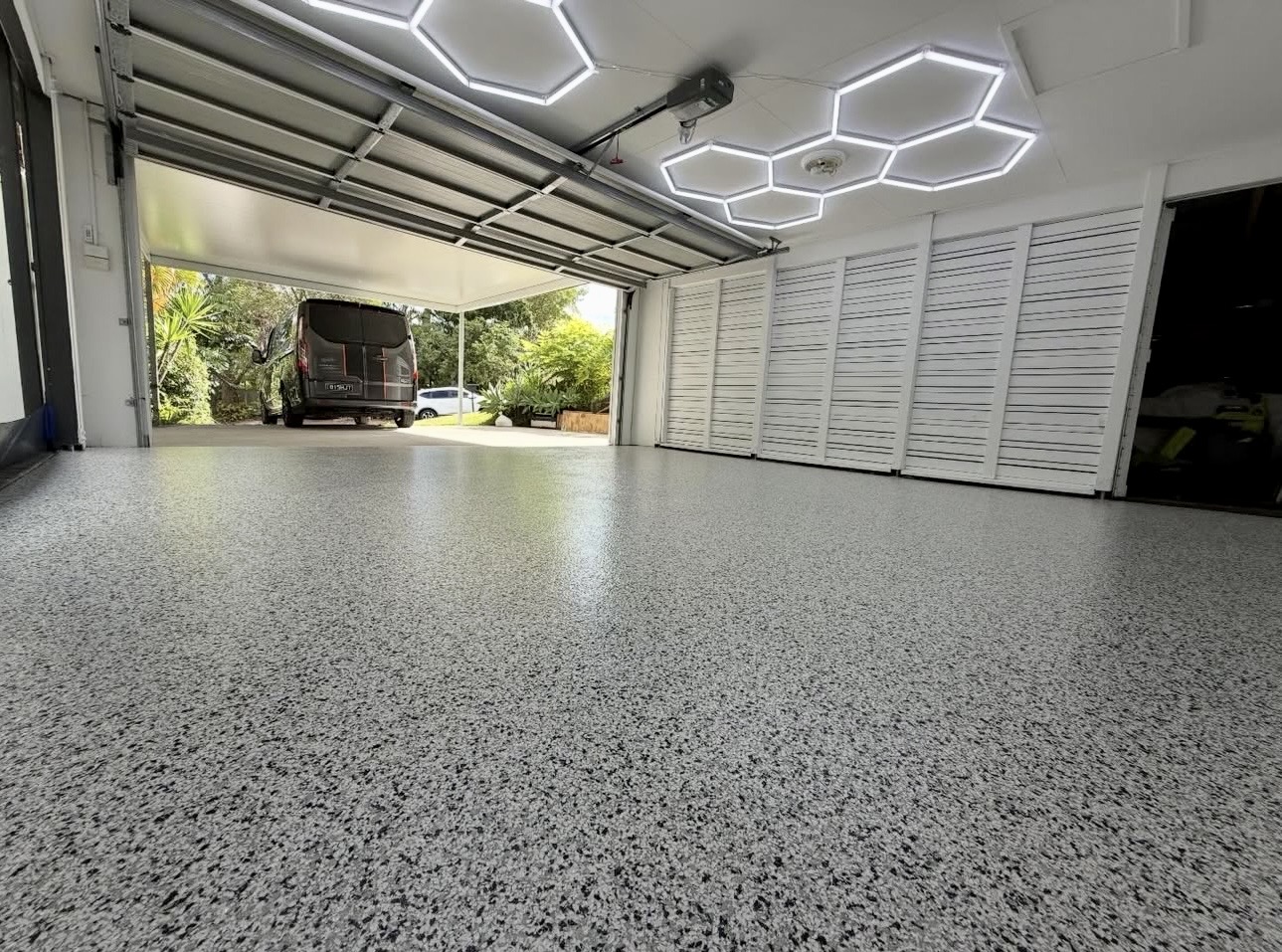 Decorative vinyl chip flake floor on outdoor patio